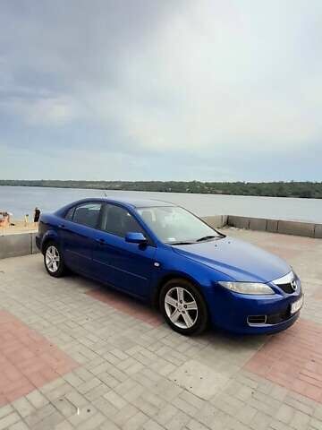 Синій Мазда 6, об'ємом двигуна 1.8 л та пробігом 248 тис. км за 4200 $, фото 1 на Automoto.ua