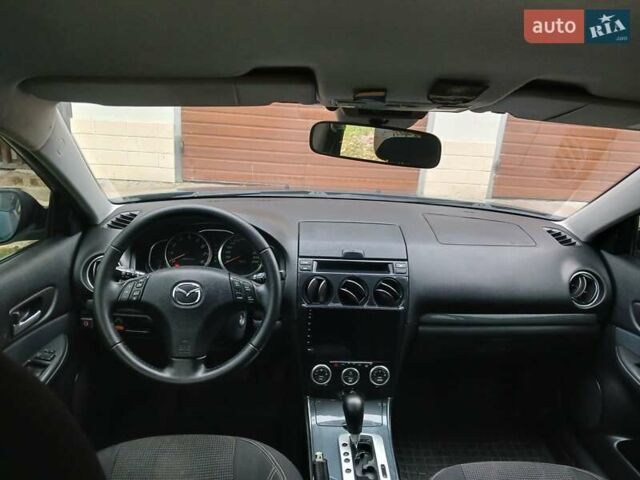 Синий Мазда 6, объемом двигателя 2 л и пробегом 253 тыс. км за 5300 $, фото 1 на Automoto.ua