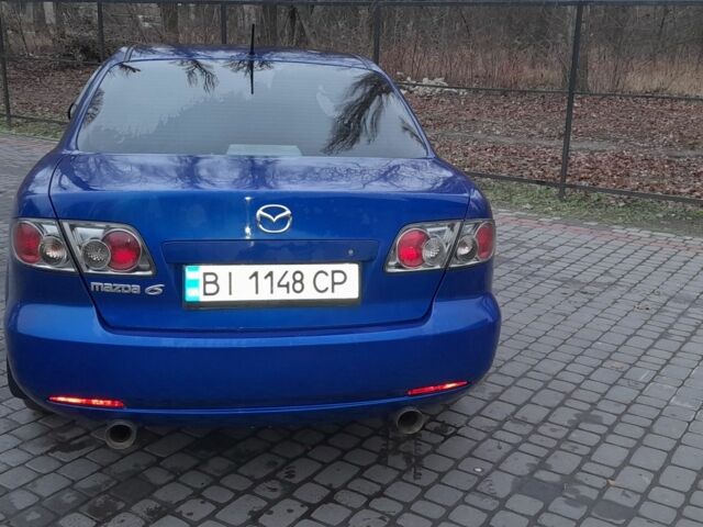 Синій Мазда 6, об'ємом двигуна 2 л та пробігом 270 тис. км за 4700 $, фото 5 на Automoto.ua