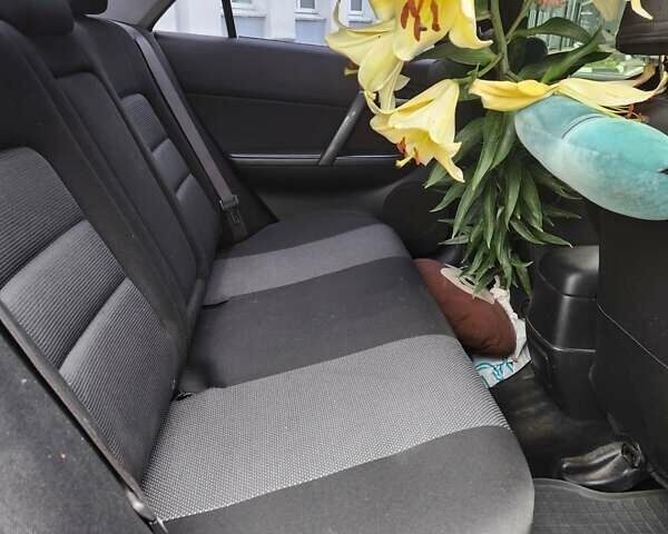 Синій Мазда 6, об'ємом двигуна 2 л та пробігом 250 тис. км за 2800 $, фото 5 на Automoto.ua