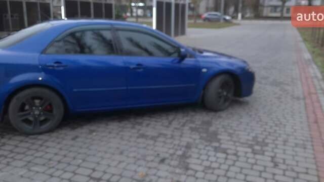 Синій Мазда 6, об'ємом двигуна 2 л та пробігом 270 тис. км за 4700 $, фото 4 на Automoto.ua