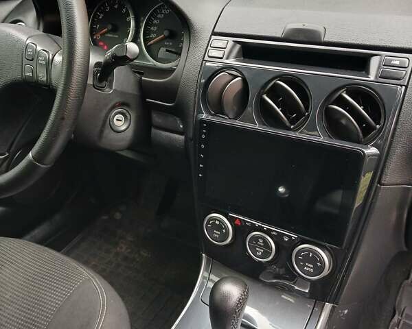 Синий Мазда 6, объемом двигателя 2 л и пробегом 253 тыс. км за 5300 $, фото 9 на Automoto.ua