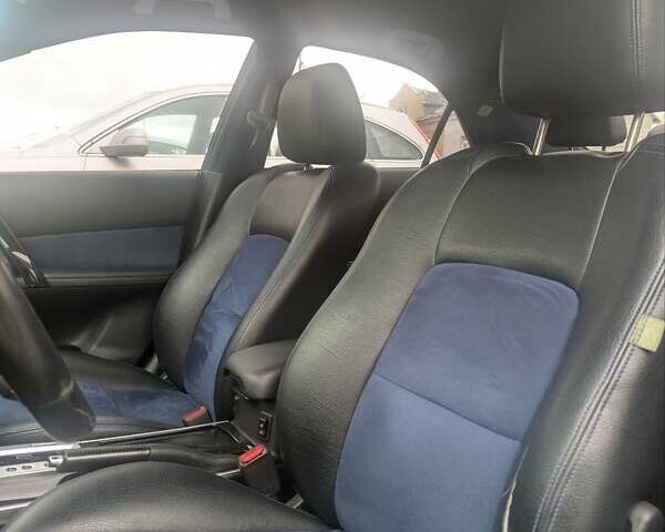 Синий Мазда 6, объемом двигателя 2 л и пробегом 182 тыс. км за 3500 $, фото 9 на Automoto.ua