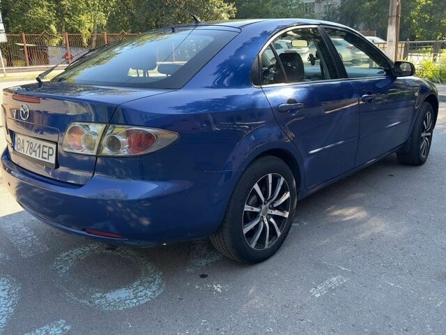 Синий Мазда 6, объемом двигателя 2.26 л и пробегом 325 тыс. км за 3950 $, фото 4 на Automoto.ua