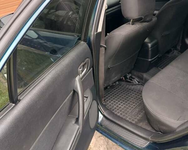 Синий Мазда 6, объемом двигателя 2 л и пробегом 253 тыс. км за 5300 $, фото 3 на Automoto.ua