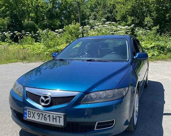 Синий Мазда 6, объемом двигателя 1.8 л и пробегом 240 тыс. км за 5200 $, фото 1 на Automoto.ua