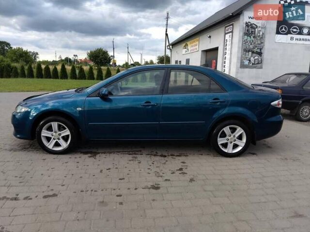 Синий Мазда 6, объемом двигателя 1.8 л и пробегом 315 тыс. км за 5350 $, фото 3 на Automoto.ua
