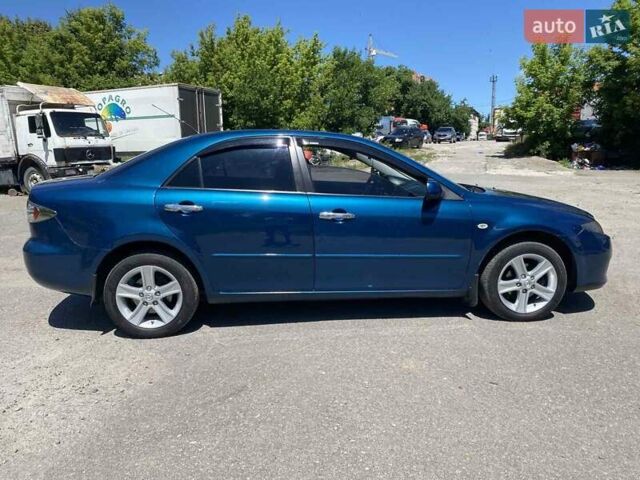 Синий Мазда 6, объемом двигателя 1.8 л и пробегом 240 тыс. км за 5200 $, фото 4 на Automoto.ua