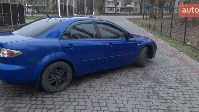 Синій Мазда 6, об'ємом двигуна 2 л та пробігом 270 тис. км за 4700 $, фото 5 на Automoto.ua