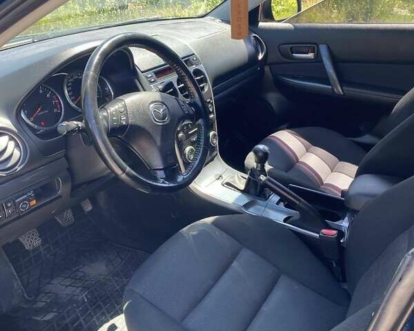 Синий Мазда 6, объемом двигателя 1.8 л и пробегом 240 тыс. км за 5200 $, фото 16 на Automoto.ua