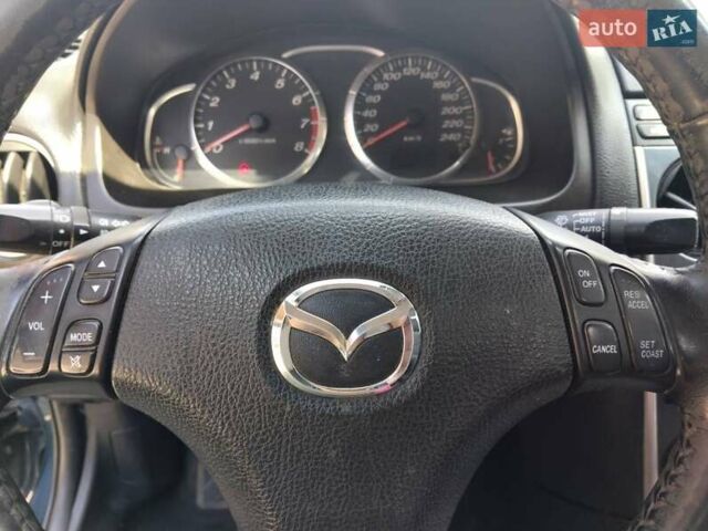 Синий Мазда 6, объемом двигателя 1.8 л и пробегом 315 тыс. км за 5350 $, фото 13 на Automoto.ua