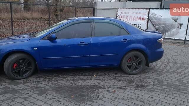 Синій Мазда 6, об'ємом двигуна 2 л та пробігом 270 тис. км за 4700 $, фото 6 на Automoto.ua