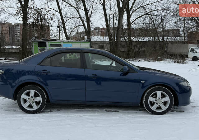 Синій Мазда 6, об'ємом двигуна 2 л та пробігом 219 тис. км за 5500 $, фото 3 на Automoto.ua