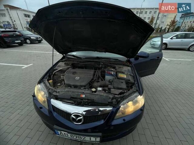 Синий Мазда 6, объемом двигателя 1.8 л и пробегом 211 тыс. км за 5500 $, фото 6 на Automoto.ua