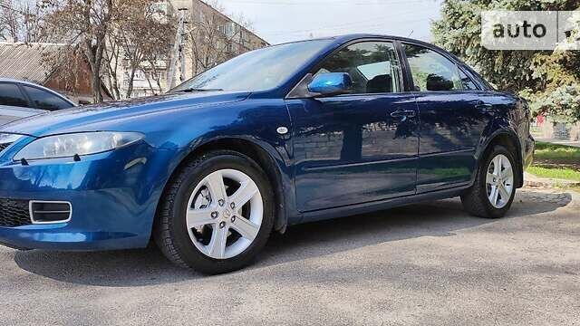 Синій Мазда 6, об'ємом двигуна 2 л та пробігом 244 тис. км за 6300 $, фото 1 на Automoto.ua