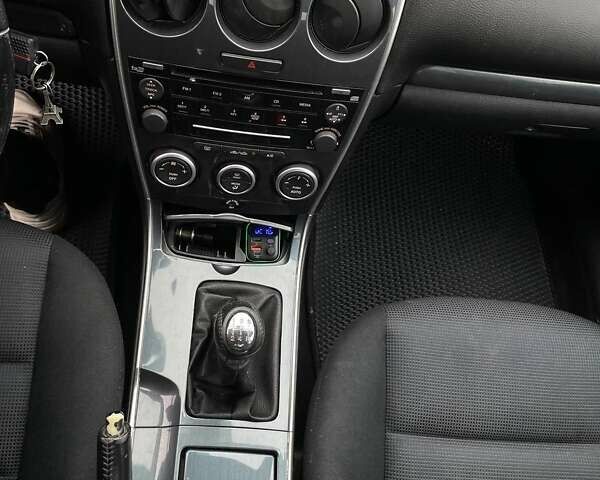 Синий Мазда 6, объемом двигателя 1.8 л и пробегом 211 тыс. км за 5500 $, фото 3 на Automoto.ua