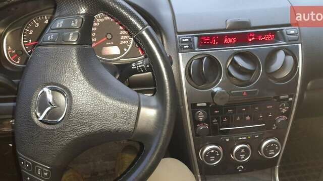 Синій Мазда 6, об'ємом двигуна 2 л та пробігом 270 тис. км за 4700 $, фото 24 на Automoto.ua