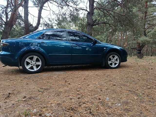 Синий Мазда 6, объемом двигателя 1.8 л и пробегом 230 тыс. км за 4800 $, фото 3 на Automoto.ua