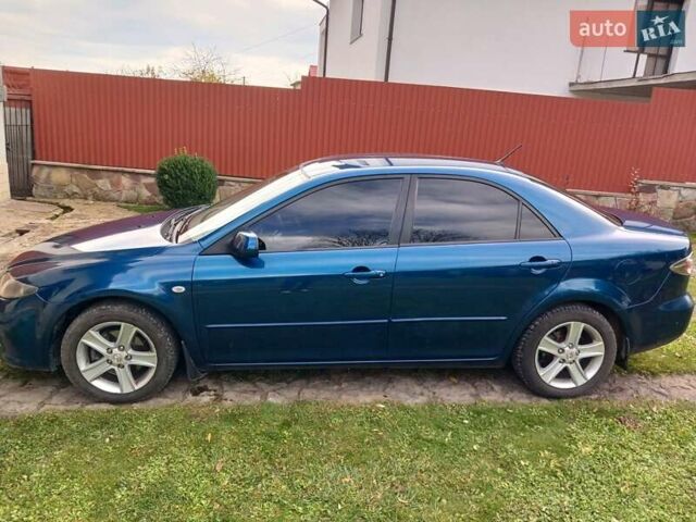 Синий Мазда 6, объемом двигателя 2 л и пробегом 253 тыс. км за 5300 $, фото 5 на Automoto.ua