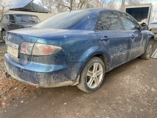 Синий Мазда 6, объемом двигателя 2 л и пробегом 300 тыс. км за 1200 $, фото 4 на Automoto.ua