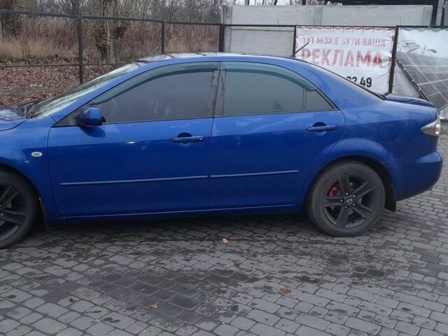Синій Мазда 6, об'ємом двигуна 2 л та пробігом 270 тис. км за 4700 $, фото 2 на Automoto.ua
