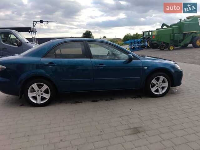 Синий Мазда 6, объемом двигателя 1.8 л и пробегом 315 тыс. км за 5350 $, фото 7 на Automoto.ua