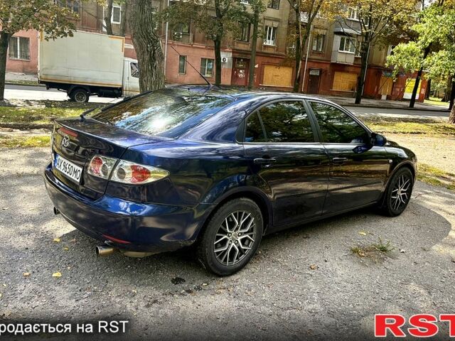 Синий Мазда 6, объемом двигателя 2.3 л и пробегом 177 тыс. км за 3850 $, фото 2 на Automoto.ua