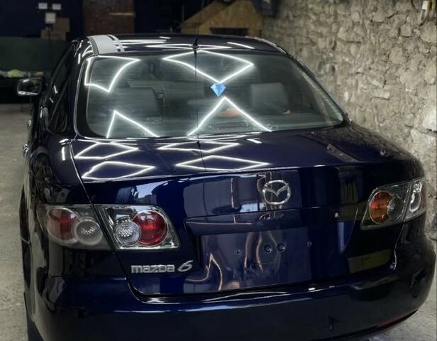 Синій Мазда 6, об'ємом двигуна 1.8 л та пробігом 214 тис. км за 4011 $, фото 3 на Automoto.ua