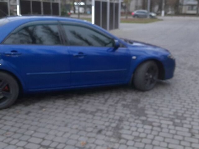 Синій Мазда 6, об'ємом двигуна 2 л та пробігом 270 тис. км за 4700 $, фото 3 на Automoto.ua