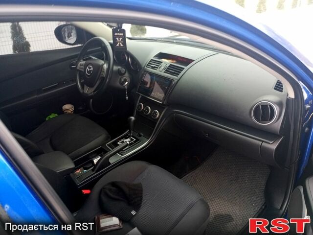 Синий Мазда 6, объемом двигателя 2 л и пробегом 318 тыс. км за 6350 $, фото 7 на Automoto.ua