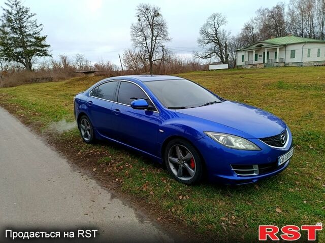 Синий Мазда 6, объемом двигателя 2 л и пробегом 318 тыс. км за 6350 $, фото 2 на Automoto.ua