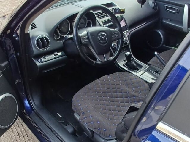 Синий Мазда 6, объемом двигателя 2 л и пробегом 370 тыс. км за 6300 $, фото 5 на Automoto.ua