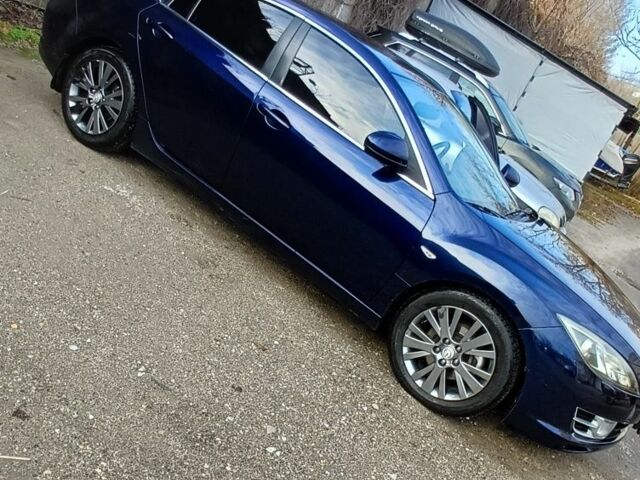 Синий Мазда 6, объемом двигателя 2 л и пробегом 370 тыс. км за 6300 $, фото 2 на Automoto.ua