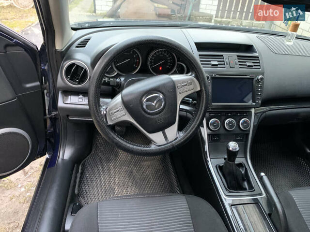 Синий Мазда 6, объемом двигателя 2 л и пробегом 220 тыс. км за 6999 $, фото 14 на Automoto.ua