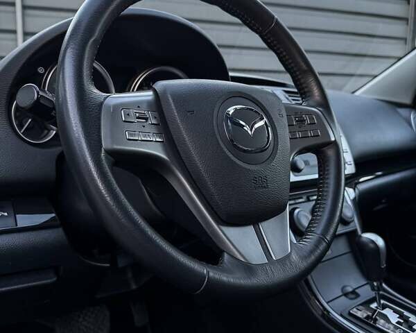 Синий Мазда 6, объемом двигателя 2 л и пробегом 174 тыс. км за 9900 $, фото 48 на Automoto.ua