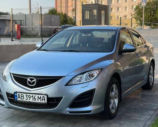 Синий Мазда 6, объемом двигателя 1.8 л и пробегом 247 тыс. км за 7000 $, фото 1 на Automoto.ua