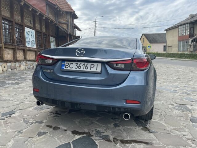 Синій Мазда 6, об'ємом двигуна 2.5 л та пробігом 244 тис. км за 9250 $, фото 8 на Automoto.ua