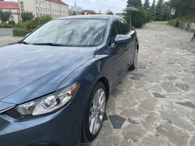 Синій Мазда 6, об'ємом двигуна 2.5 л та пробігом 244 тис. км за 9250 $, фото 4 на Automoto.ua