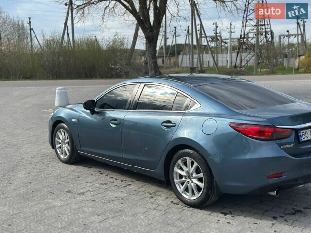 Синій Мазда 6, об'ємом двигуна 2.2 л та пробігом 232 тис. км за 9900 $, фото 1 на Automoto.ua