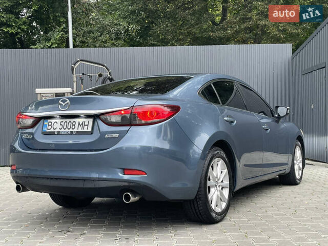 Синій Мазда 6, об'ємом двигуна 2.49 л та пробігом 240 тис. км за 9450 $, фото 11 на Automoto.ua