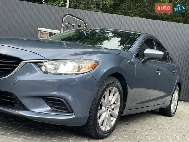 Синій Мазда 6, об'ємом двигуна 2.49 л та пробігом 240 тис. км за 9450 $, фото 1 на Automoto.ua