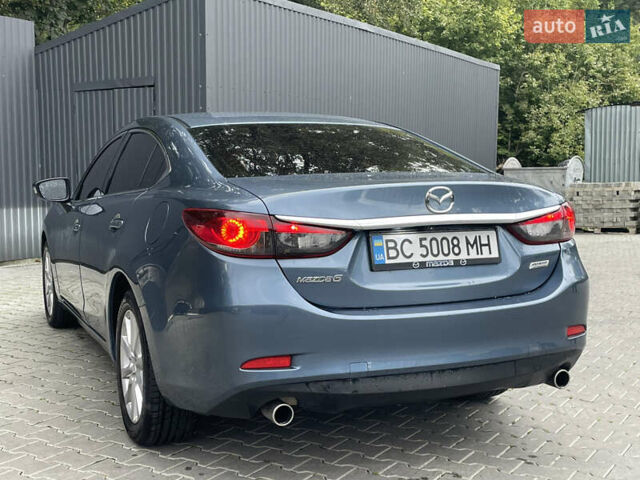 Синій Мазда 6, об'ємом двигуна 2.49 л та пробігом 240 тис. км за 9450 $, фото 12 на Automoto.ua