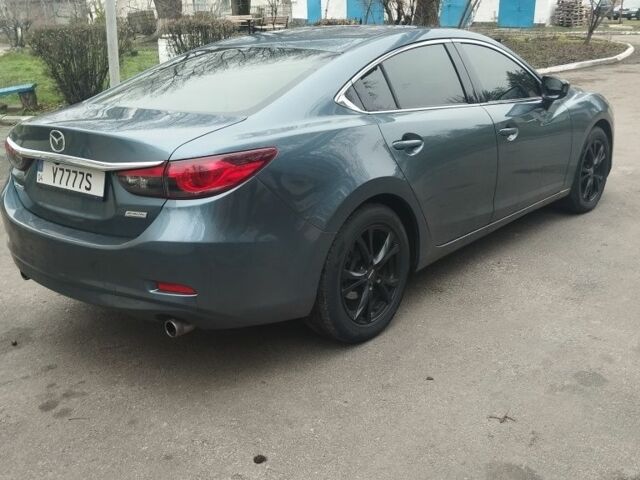 Синий Мазда 6, объемом двигателя 2.5 л и пробегом 212 тыс. км за 10700 $, фото 4 на Automoto.ua