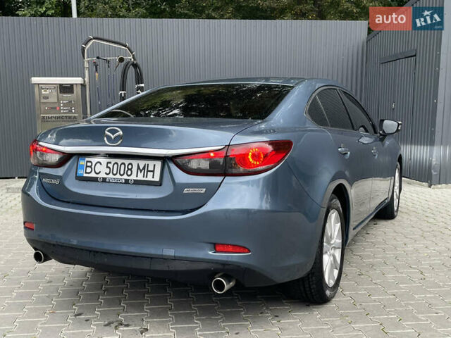 Синій Мазда 6, об'ємом двигуна 2.49 л та пробігом 240 тис. км за 9450 $, фото 20 на Automoto.ua