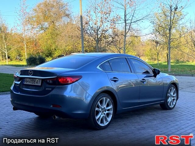 Синій Мазда 6, об'ємом двигуна 2.5 л та пробігом 175 тис. км за 9900 $, фото 3 на Automoto.ua