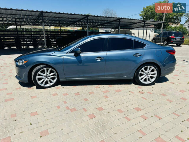 Синий Мазда 6, объемом двигателя 2.49 л и пробегом 243 тыс. км за 10500 $, фото 3 на Automoto.ua
