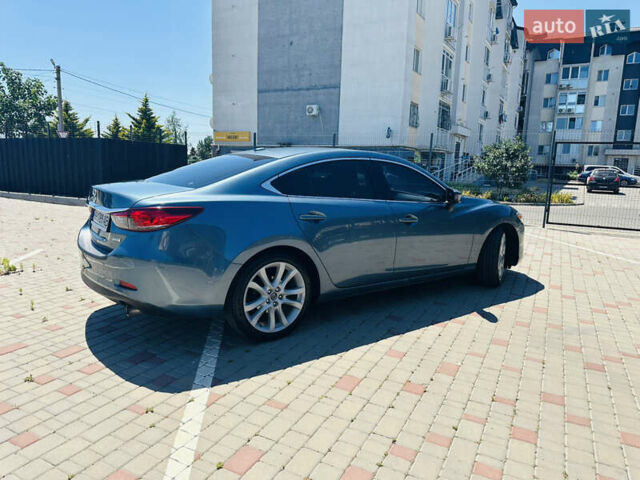 Синий Мазда 6, объемом двигателя 2.49 л и пробегом 243 тыс. км за 10500 $, фото 5 на Automoto.ua