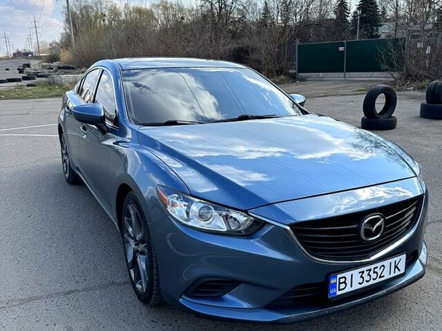 Синий Мазда 6, объемом двигателя 25 л и пробегом 228 тыс. км за 12600 $, фото 2 на Automoto.ua