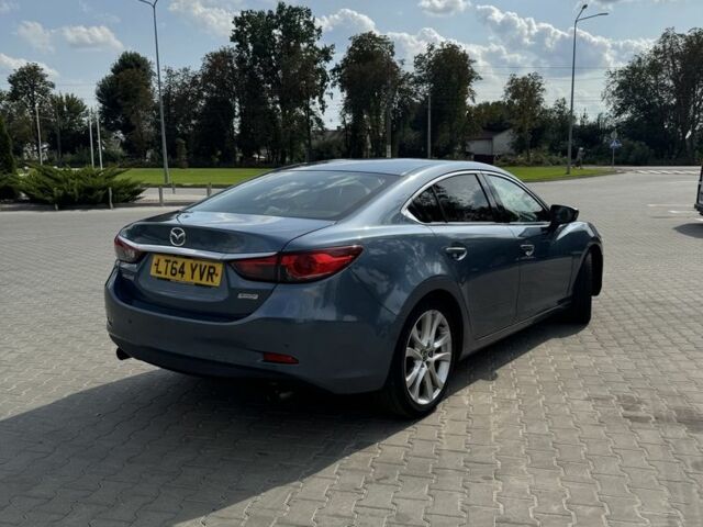 Синій Мазда 6, об'ємом двигуна 2.2 л та пробігом 210 тис. км за 5500 $, фото 3 на Automoto.ua