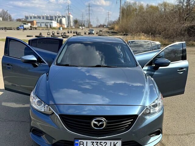 Синий Мазда 6, объемом двигателя 25 л и пробегом 228 тыс. км за 12600 $, фото 4 на Automoto.ua